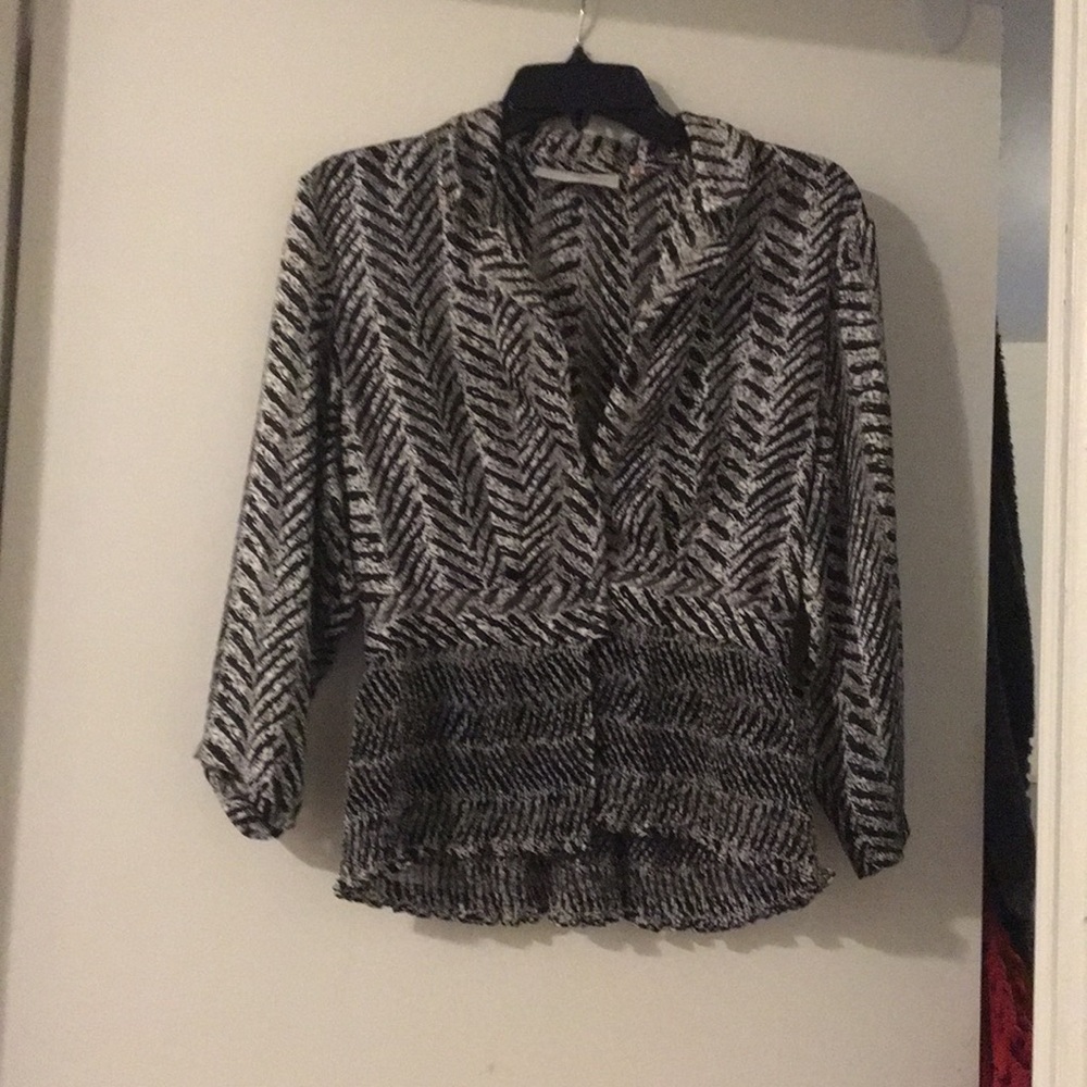 Black and white peplum blouse
